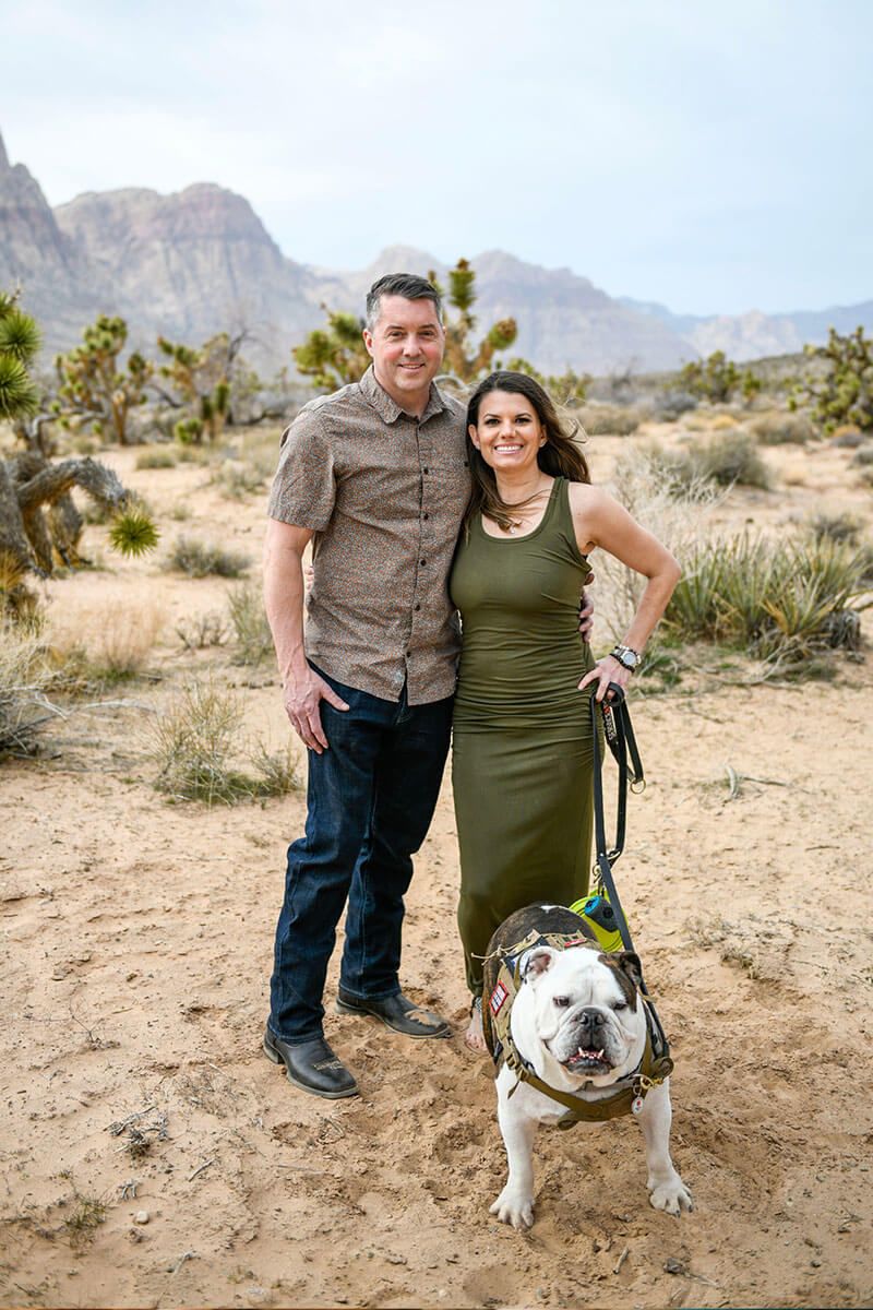 Wounded warrior Melissa McMahon and her husband posing together in the desert outside Las Vegas.