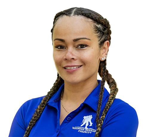 Warrior Antoinette Wallace portrait in blue Wounded Warrior Project polo against light background.