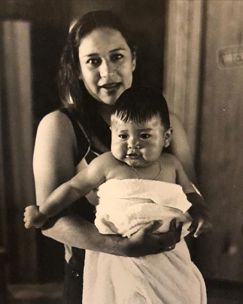 Lori Piestewa holds her young son, Brandon. Lori joined the Army in 2001 and was killed in Iraq in 2003 at just 23 years old