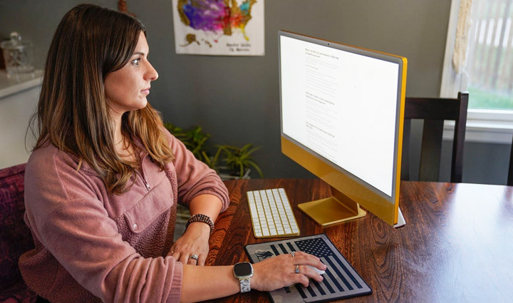 Wounded Warrior Keara Torkelson On Computer
