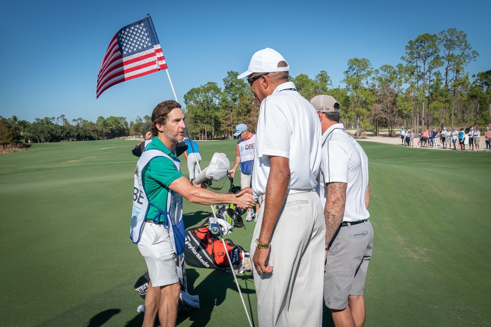 Warrior receiving flag