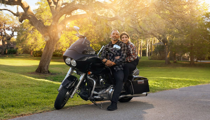 Bill Geiger and his wife on a motorcycle