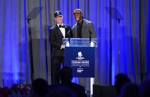 WWP CEO Lt. Gen. (Ret.) Walt Piatt and former Pro Bowl quarterback Robert Griffin III on stage at the annual Courage Awards & Benefit Dinner on Sept. 10, 2024, in Washington, DC.