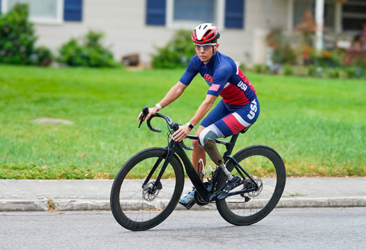 WWP warrior and Army veteran Kelly Elmlinger will compete in the triathlon of the 2024 Paralympics in Paris.