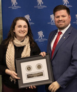 Faith Williams accepting an award.