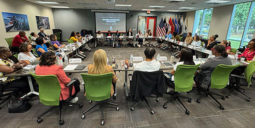 Women veterans take part in a Women Warriors Roundtable event.