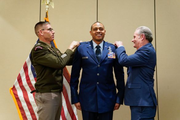 Tyshawn Jenkins receives his USAF Captain rank pins.