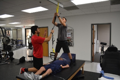 Cody (seen here in the gray shirt)