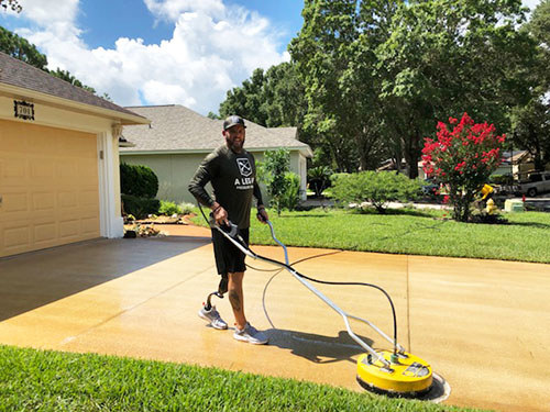 Warrior Sean Karpf owns A Leg Up Pressure Washing