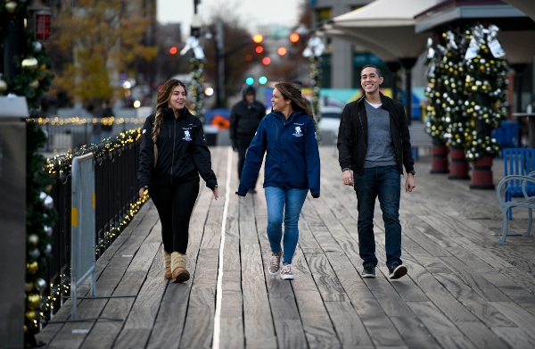 Warrior Antoinette Wallace (center) walks with friends.