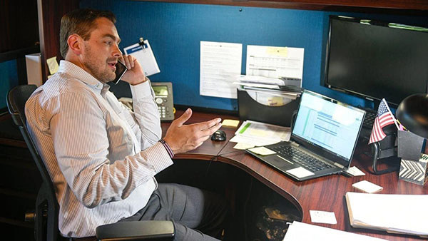man on computer