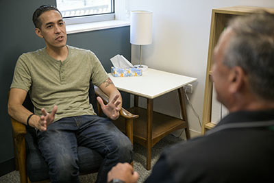A warrior talking to a counselor.