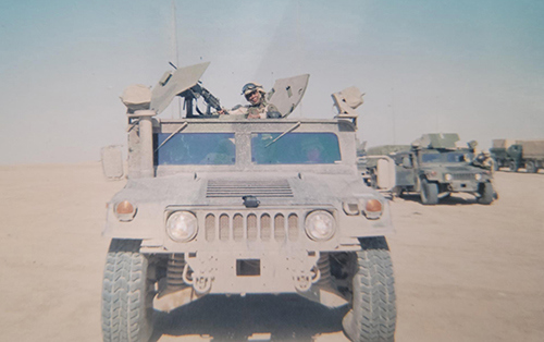 Danielle Green in a Humvee while on duty in Iraq.