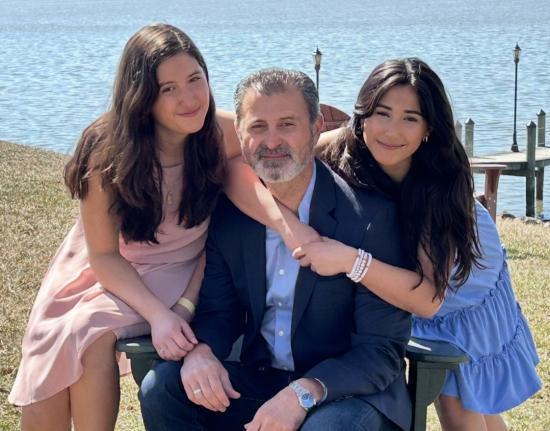 Azara Emami (right) with her father and sister.