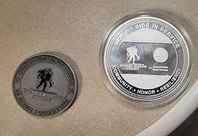 Wounded Warrior Project challenge coins from different years
