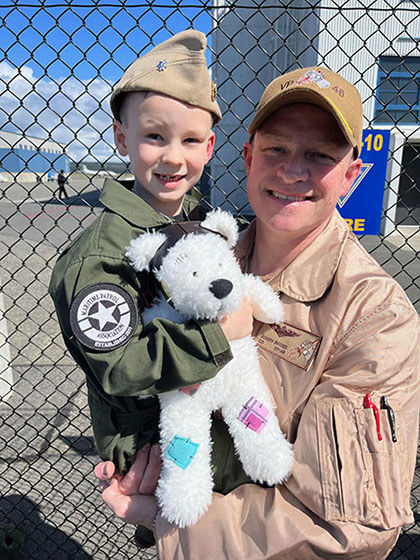 Father with son before dad leaves for military deployment.