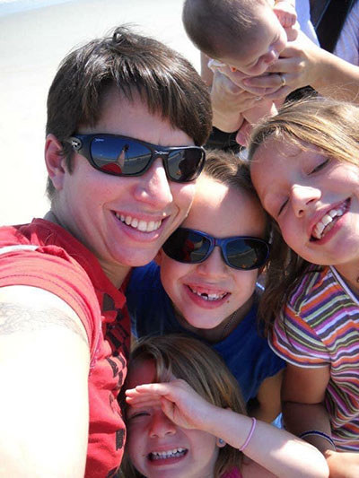 Beth with Dante and her sister's children.