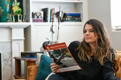 Melissa and a brochure from WWP