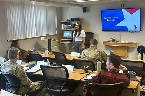 WWP staff members talk to service members about transitioning at an Air Force base in Alaska.