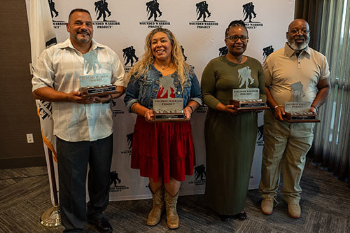 Warriors Tito Cortez, Ysabel Cardona, Barbara Tompkins, and Dexter Thames were honorees for the Rusty Baggett Peer Leader of the Year Awards.