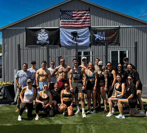 Jake Prusha with other athletes competing in the Murph Challenge.