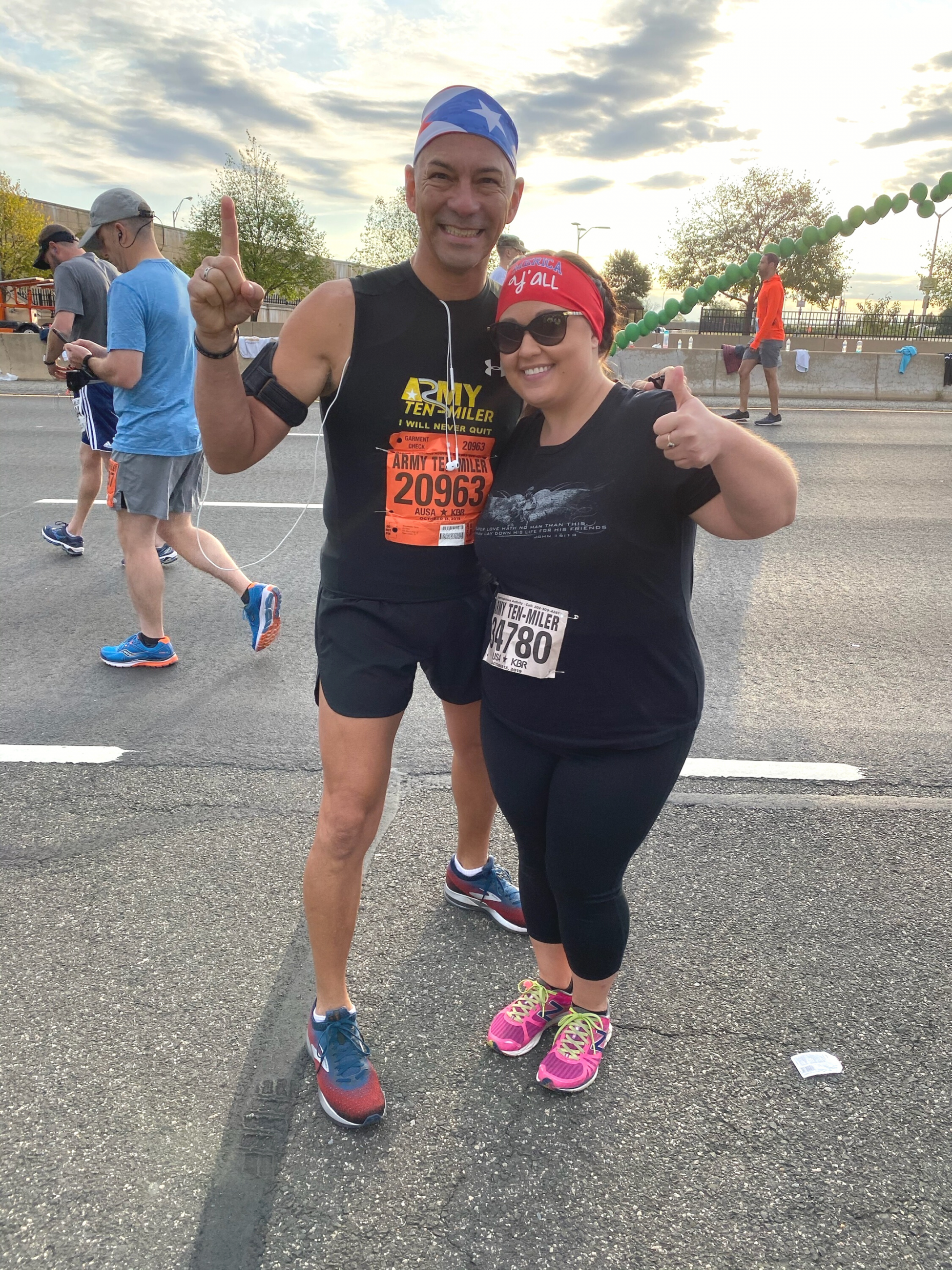 Junior Teron stands with WWP staff member Heather Lucas at the Army Ten Miler. Heather helped guide Junior during the WWP mental health workshop.