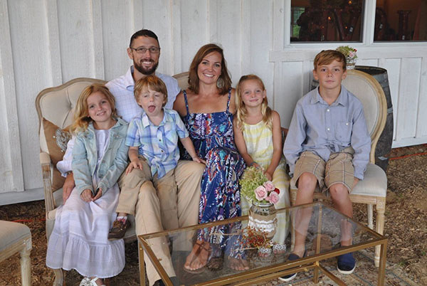 Kris (far right), the oldest of four children, is the son of Chuck and Liz Rotenberry. Chuck is a U.S. Marine Corps veteran living with PTSD, traumatic brain injury (TBI), and hearing issues.