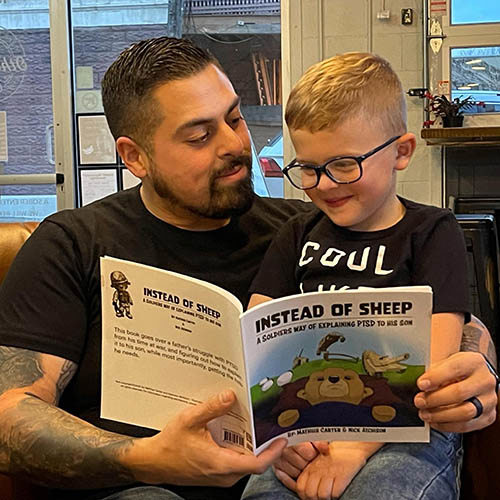 Army veteran Mathius Carter reads his book, Instead of Sheep: A Soldier’s Way of Explaining PTSD to his Son, to his young son. Mathius wrote the book to better explain veteran PTSD to children.