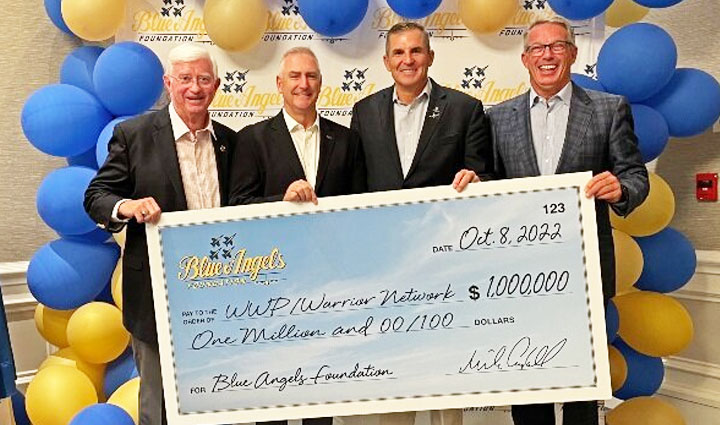 Check presentation with the Blue Angels Foundation and WWP CEO Mike Linnington