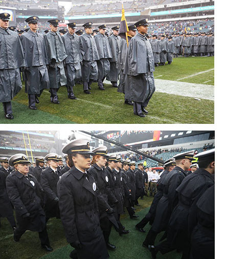 Members of the Army and Navy marching bands take the field before a game.