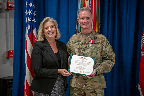 U.S. Army Lt. Gen. (Ret.) Walter E. Piatt, center, his wife Cynthia, and Secretary of the U.S. Army Christine E. Wormuth, left, during Piatt’s retirement ceremony at Joint Base Myer-Henderson Hall in Arlington, Virginia, Jan. 5, 2024. Piatt retired after serving over 40 years in the U.S. Army. (U.S. Army photo by Christopher Kaufmann)
