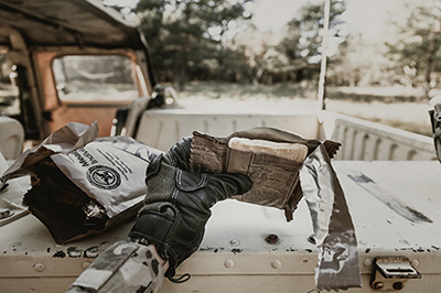 A soldier eating an MRE.