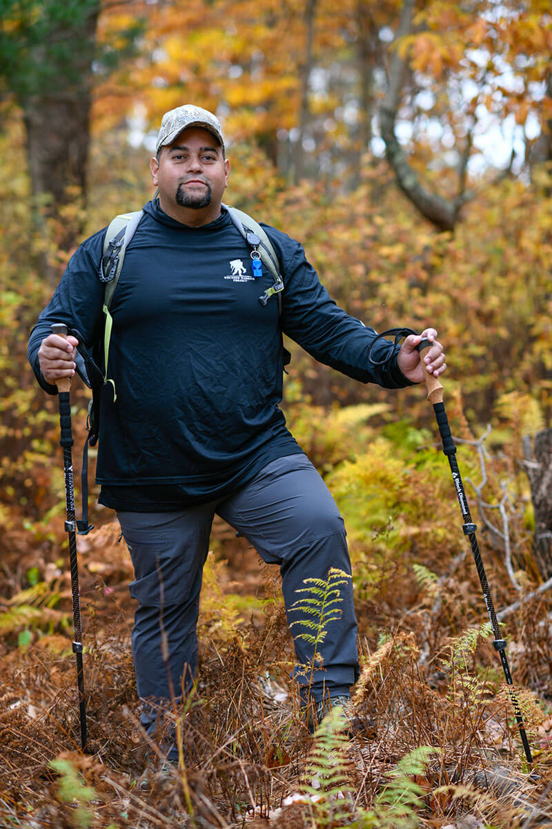 Wounded warrior Tim Aponte wearing a WWP shirt while hiking.