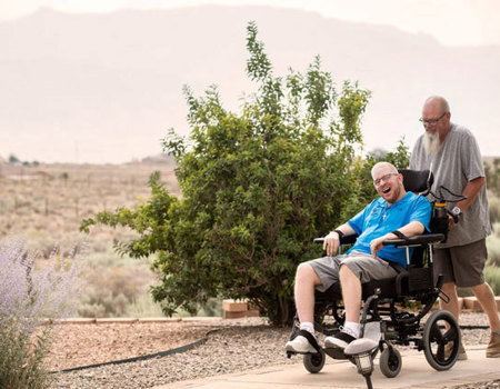 Wounded warrior Erik Schei with his father and caregiver, Gordon Schei