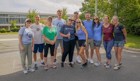Runners gather for a group photo on July 22, 2023 in Herndon, Virginia.