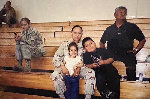 Soldier Lori Ann Piestewa with her children. Lori was the first Native American woman killed in combat while serving in the U.S. military.