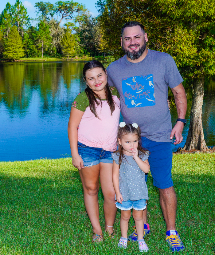 Roberto Cruz, U.S. Army (Ret.), with daughters