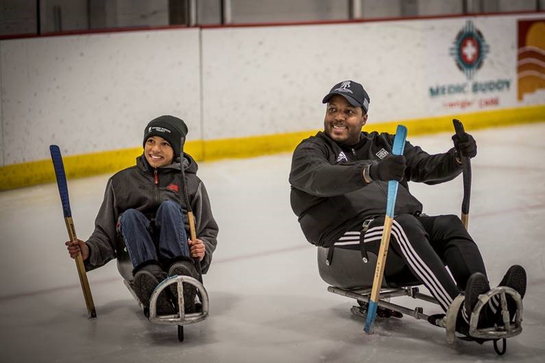 <p>Army veteran Ronnie Mondragon (right), says he comes back to WWP events for the opportunity to try new things and build camaraderie with other veterans and their families. They understand what we are going through. Photo Courtesy: Michael Sandoval