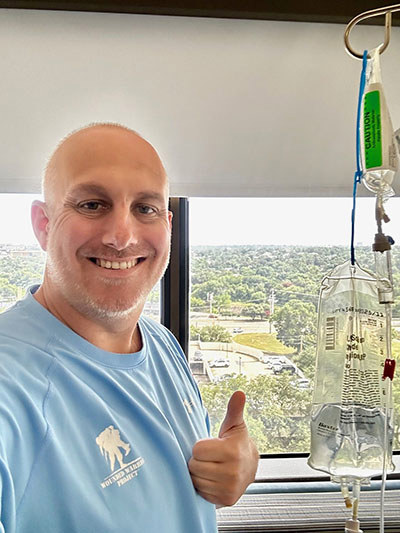 Army veteran and WWP teammate Shawn Morgan in the hospital for cancer treatment.