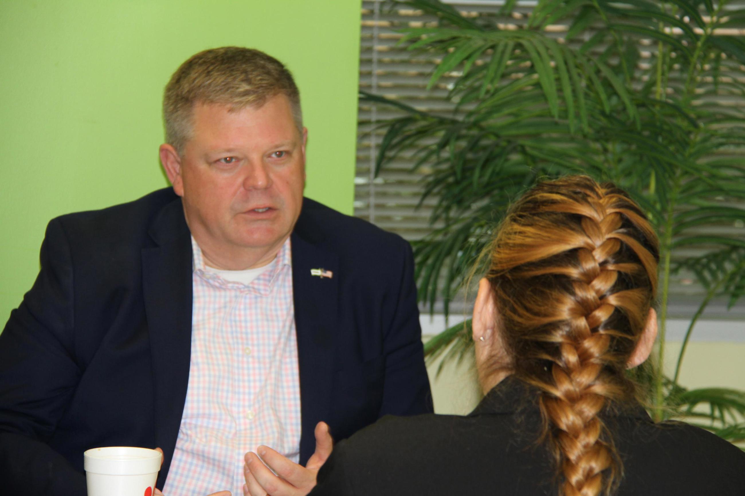 A wounded warrior receives feedback on her resume at a Deloitte employment boot camp at Wounded Warrior Project's headquarters in Jacksonville, Florida.