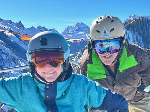 WWP warrior Mary Porter, with Alex Porter, atop a snowy mountain during the Invictus Games.