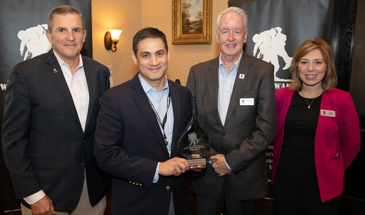 Johnson & Johnson’s Carl Legge accepting the Award for Excellence in Storytelling in 2022. 