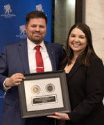 Samantha Gonzales accepting an award.