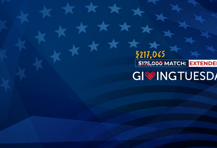 Navy blue graphic representing the US flag with the Giving Tuesday logo overlayed. A graphic shows the amount $217,065 matching gift.