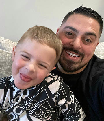 Mathius with his son.