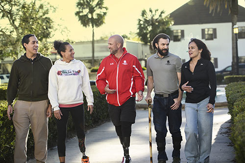 A group of warriors walking outside and connecting.