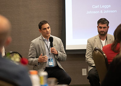 Carl Legge speaks at an event