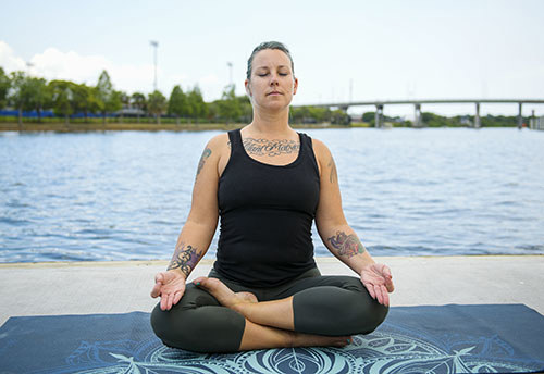 Air Force veteran Jessica Coulter doing yoga.