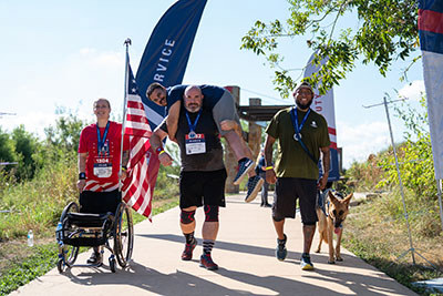 Angie Peacock participates in a WWP Carry Forward 5K with other warriors.