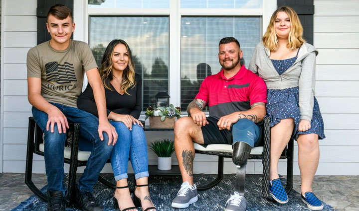 Wounded warrior Sean Karpf and his family sitting in their porch